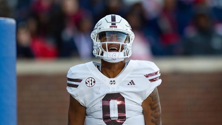Mississippi State's quarterback Michael Van Buren Jr. (0) celebrates scoring a touchdown during the Egg Bowl game against Mississippi at Vaught-Hemingway Stadium on Friday, Nov. 29, 2024.
