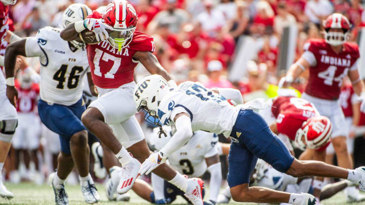 Indiana's Ty Son Lawton (17) runs during the first half of the Indiana versus Florida International football game at Memorial Stadium on Saturday, Aug. 31, 2024.