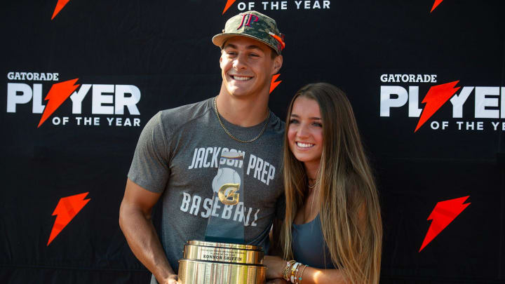 Konnor Griffin poses with his girlfriend, Dendy Hogan, after receiving his trophy for Gatorade National Baseball Player of the Year at Jackson Prep in Mississippi on June 6, 2024.