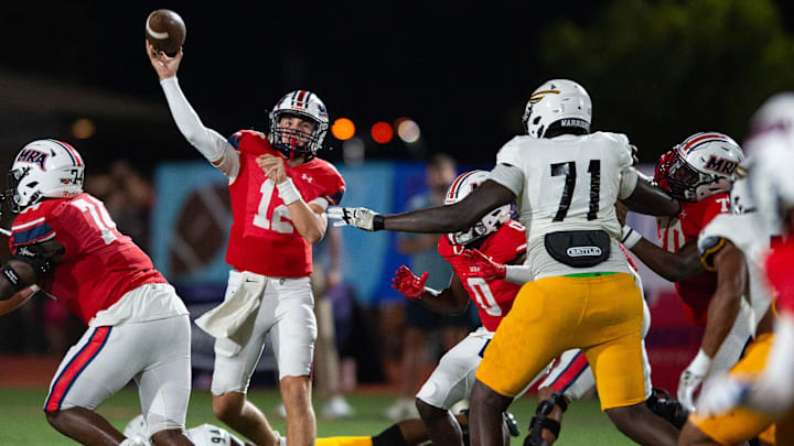 Madison-Ridgeland Academy Patriots' quarterback Samuel Stockett (12) throws the ball during the game against the Oak Grove Warriors in Madison, Miss., on Friday, Sept. 20, 2024. Madison-Ridgeland Academy Patriots' quarterback Samuel Stockett (12) throws the ball during the game against the Oak Grove Warriors in Madison, Miss., on Friday, Sept. 20, 2024.