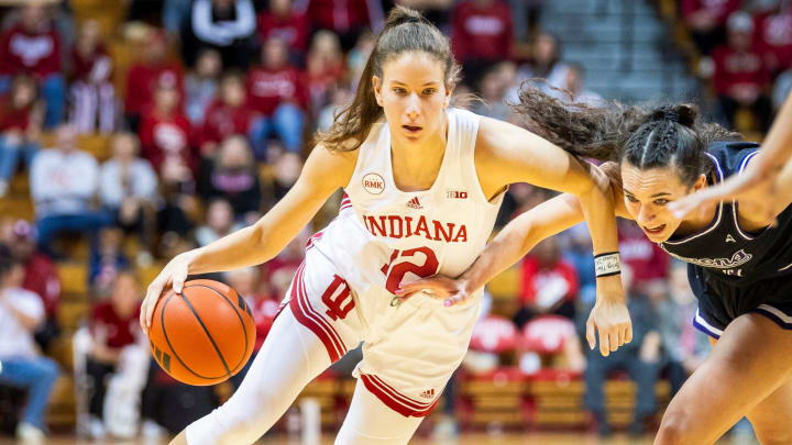 Indiana's Yarden Garzon (12) drives during the first half of the Indiana versus Lipscomb women's basketball game at Simon Skjodt Assembly Hall on Sunday, Nov. 19, 2023.