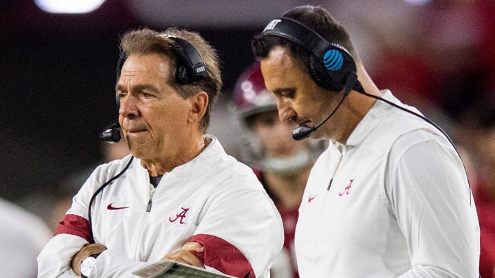 Alabama head coach Nick Saban and then-offensive coordinator Steve Sarkisian confer on the sideline during a 2019 game against Arkansas. There are 65 coaches who vote in the USA Today poll. One of them voted Texas as the No. 1 team in the country in his preseason ballot.

Saban Sark