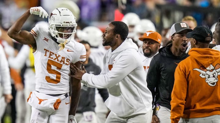 Texas Longhorns wide receiver Adonai Mitchell (5) celebrates a first down catch against TCU Horned Frogs late in the fourth quarter to keep theclock running in an NCAA college football game, Saturday, November. 11, 2023, at Amon G. Carter Stadium in Fort Worth, Texas. Texas Longhons won 29-26.