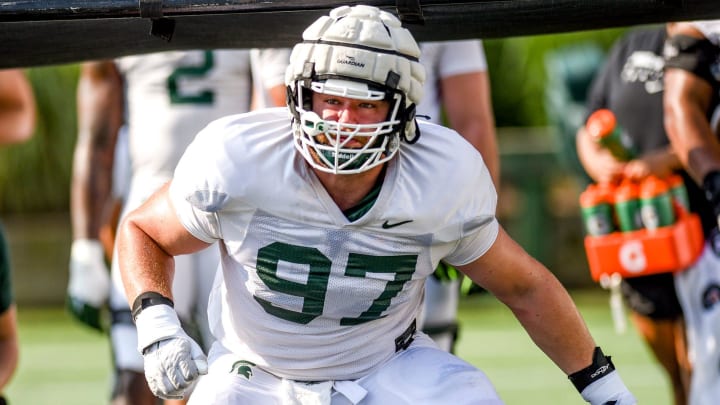 Michigan State defensive lineman Maverick Hansen runs a drill during football practice on Wednesday, Aug. 9, 2023, in East Lansing.