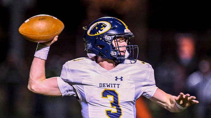 DeWitt's Elliot Larner throws a pass against Mason during the second quarter on Friday, Nov. 3, 2023, at Mason High School.