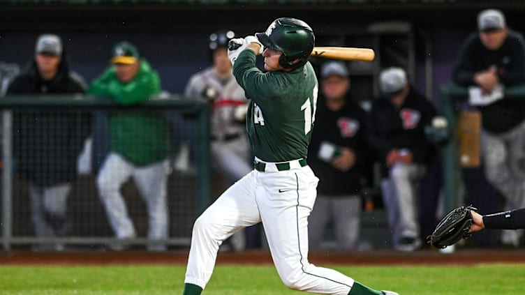 Michigan State's Mitch Jebb drives in a run against the Lugnuts in the third inning on Tuesday,