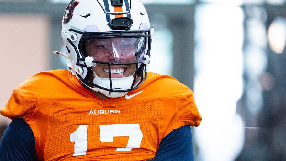 Auburn Tigers quarterback Byrum Brown warms up during football practice.