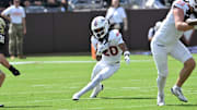 Sep 20, 2025; Blacksburg, Va.; Virginia Tech running back P.J. Prioleau (20) runs the ball during the first quarter.