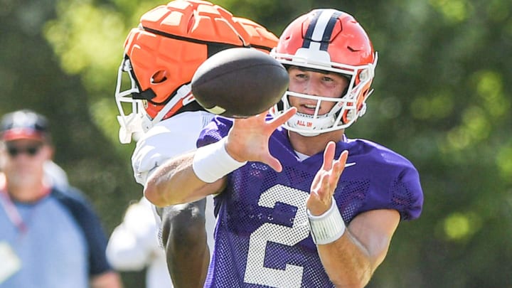 Clemson quarterback Cade Klubnik (2) catches a ball during Clemson football practice at Jervey Meadows in Clemson, S.C. Wednesday, August 7, 2024.