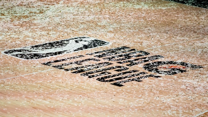 Mar 11, 2021; Orlando, Florida, USA; The NBA G League logo is covered in confetti after the Final between the Delaware Blue Coats and the Lakeland Magic at AdventHealth Arena. 