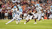 Sep 13, 2025; Blacksburg, Va.; Virginia Tech quarterback Kyron Drones (1) runs the ball.