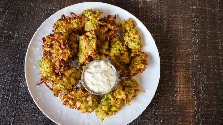 Fritters can be a party appetizer or a solo snack.