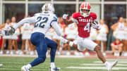 Indiana's Myles Price (4) runs after the catch during the first half of the Indiana versus Florida International football game at Memorial Stadium on Saturday, Aug. 31, 2024.