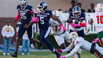 Jackson State Tigers' running back Irv Mulligan (5) runs the ball during the game against the Florida A&M Rattlers in Jackson, Miss., on Saturday, Oct. 19, 2024.