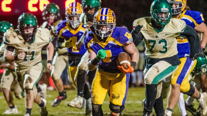 CHARLTON - Bay Path   s Kaiden Brochu breaks through the Greater New Bedford defense and scores in the second quarter Friday, November 17, 2023.