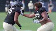 Purdue offensive lineman Jaelin Alstott-VanDeVanter (65) and Purdue offensive lineman Marcus Mbow (63) during practice, Friday, Aug. 13, 2021 at Bimel Practice Complex in West Lafayette.

Purdue Football Camp