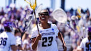 Northwestern defender Sammy White runs onto the field before an NCAA Lacrosse Tournament game against Michigan on May 11, 2025.
