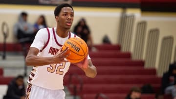 Germantown Mavericks' center Sam Funches (32) passes the ball during the game against the Tupelo Golden Wave at Germantown High School in Madison, Miss., on Tuesday, Jan. 30, 2024.