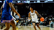 Wake Forest player Juke Harris dribbles ball against American 