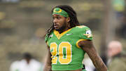 Nov 9, 2024; Eugene, Oregon, USA; Oregon Ducks running back Jordan James (20) warms up before a game against the Maryland Terrapins at Autzen Stadium.
