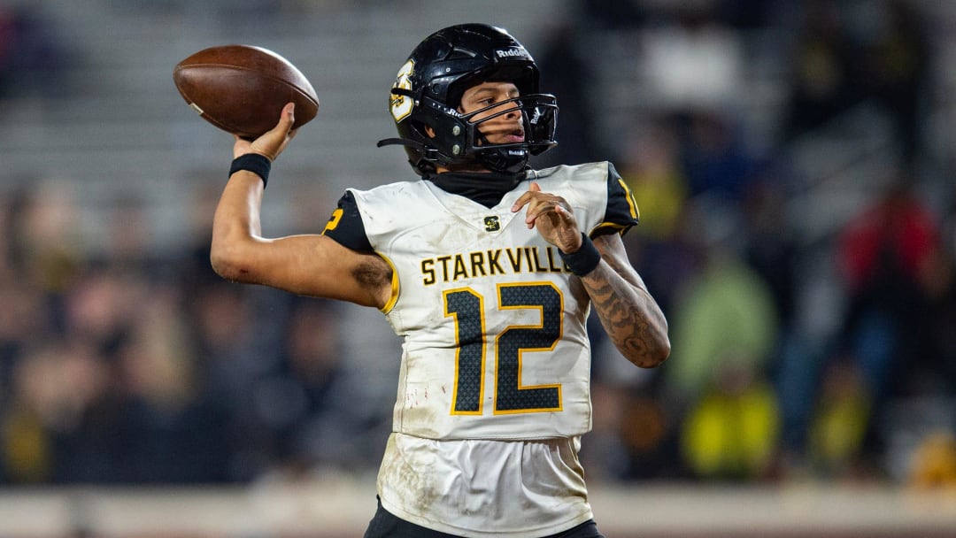 Starkville Yellowjackets' quarterback Billy Petty (12) gears up to pass the ball during the MHSAA 7A football state title game at Vaught-Hemingway Stadium in Oxford, Miss., on Dec. 2, 2023.