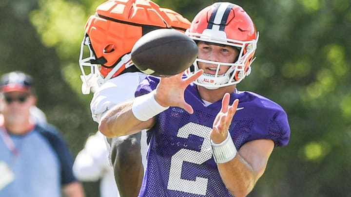 Clemson quarterback Cade Klubnik (2) catches a ball during Clemson football practice at Jervey Meadows in Clemson, S.C. Friday August 7, 2024.