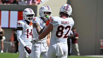 Sep 20, 2025; Blacksburg, Va.; Virginia Tech tight end Benji Gosnell (82) congratulates wide receiver Ayden Greene (0) on a touchdown.
