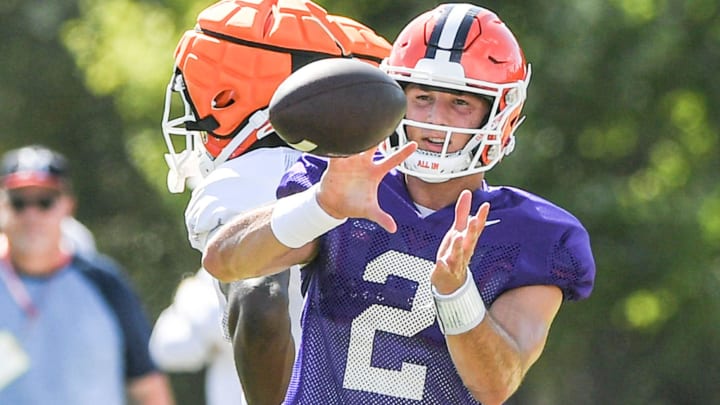 Clemson quarterback Cade Klubnik (2) catches a ball during Clemson football practice at Jervey Meadows in Clemson, S.C. Wednesday August 7, 2024.