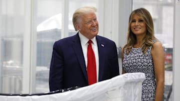 President Donald Trump along with First Lady Melania Trump tour the Orion Capsule Room at the Kennedy Space Center