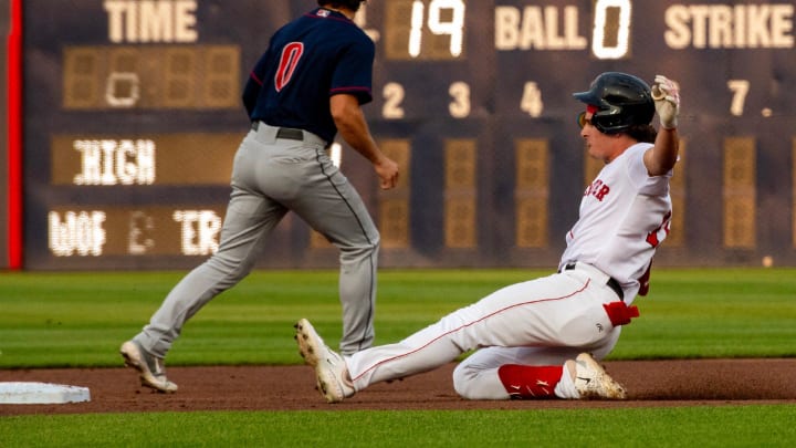 Worcester's Roman Anthony slides into second base for a leadoff double Tuesday at Polar Park against Lehigh Valley. It was his first hit in Triple A.