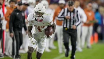 Texas Longhorns wide receiver Xavier Worthy (1) looks up field as he runs for the first down against TCU Horned Frogs in the second quarter of an NCAA college football game, Saturday, November. 11, 2023, at Amon G. Carter Stadium in Fort Worth, Texas.