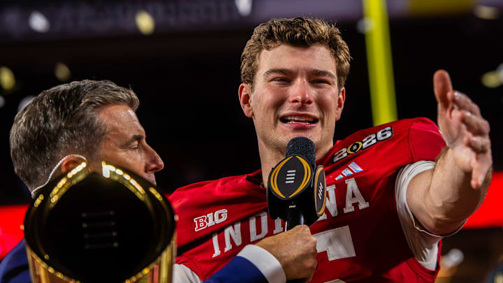 Indiana's Fernando Mendoza (15) talks to the crowd on the podium after the College Football Playoff National Championship college football game at Hard Rock Stadium in Miami Gardens on Monday, Jan. 19, 2026.
