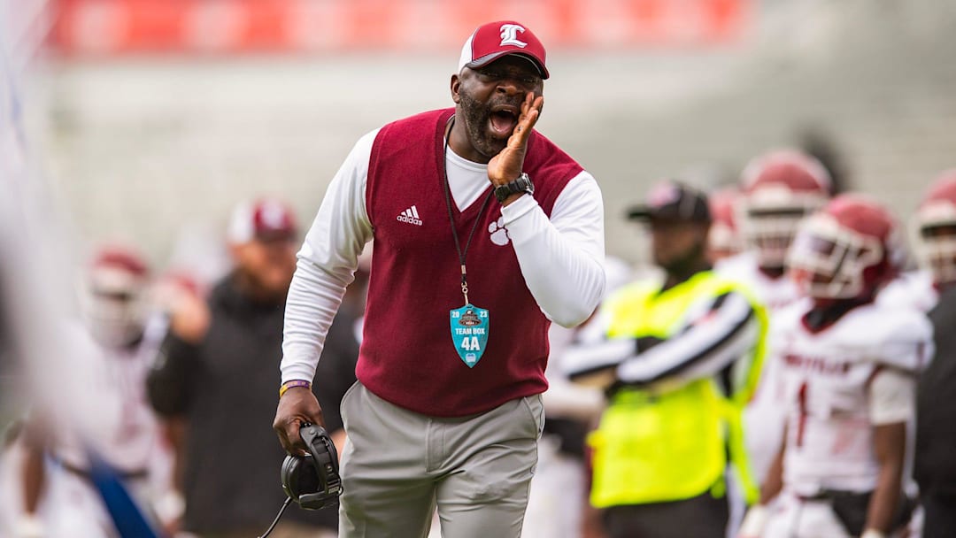 Louisville Wildcats' head coach Tyronne Shorter shouts during the MHSAA 4A football state title game against the Columbia Wildcats at Vaught-Hemingway Stadium in Oxford, Miss., on Saturday, Dec. 2, 2023.