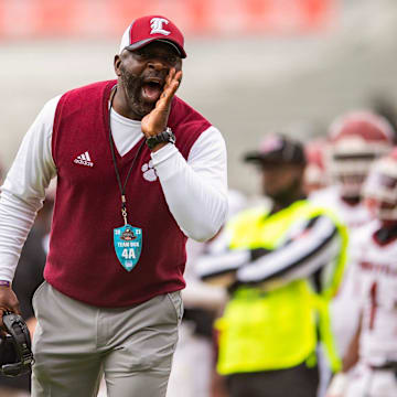 Louisville Wildcats' head coach Tyronne Shorter shouts during the MHSAA 4A football state title game against the Columbia Wildcats at Vaught-Hemingway Stadium in Oxford, Miss., on Saturday, Dec. 2, 2023.