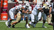 Sep. 20, 2025; Blacksburg, Va.; Virginia Tech quarterback Kyron Drones (1) runs the ball during the second quarter.