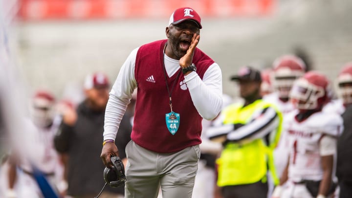 Louisville Wildcats' head coach Tyrone Shorter shouts during the MHSAA 4A football state title game against the Columbia Wildcats at Vaught-Hemingway Stadium in Oxford, Miss., on Saturday, Dec. 2, 2023.