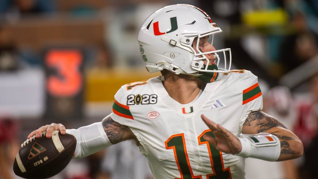 Miami's Carson Beck (11) throws during the College Football Playoff National Championship college football game at Hard Rock Stadium in Miami Gardens on Monday, Jan. 19, 2026.