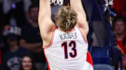 Nov 11, 2025; Tucson, Arizona, USA; Arizona Wildcats center Motiejus Krivas (13) dunks the ball during the first half of the game against the Northern Arizona Lumberjacks at McKale Memorial Center. Mandatory Credit: Aryanna Frank-Imagn Images