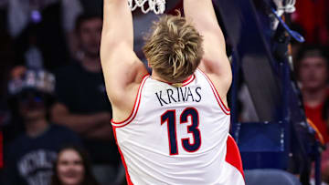 Nov 11, 2025; Tucson, Arizona, USA; Arizona Wildcats center Motiejus Krivas (13) dunks the ball during the first half of the game against the Northern Arizona Lumberjacks at McKale Memorial Center. Mandatory Credit: Aryanna Frank-Imagn Images