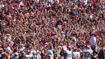 Oklahoma Sooners fans celebrate the winning touchdown against Texas Longhorns late in the fourth quarter 34-30 during an NCAA college football game at the Cotton Bowl on Saturday, Oct. 7, 2023 in Dallas, Texas. 