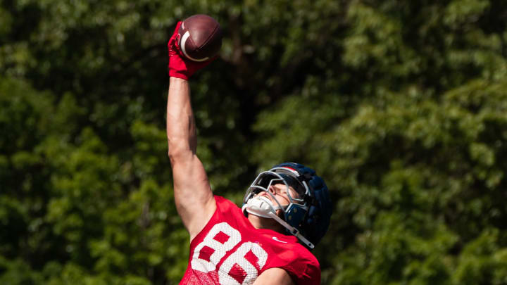 Caden Prieskorn makes a one-handed catch during a session of Ole Miss' fall camp.