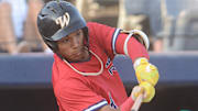 Brockton Rox's D'Angelo Ortiz, son of Red Sox great David Ortiz, hits a fly ball to Sea Unicorn's Hunter Yaworski, of Brooklyn, for an out Thursday during a game at Dodd Stadium in Norwich.

000 Sea Unicorns