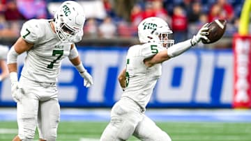 Forest Hills Central's Ty Hudkins celebrates his interception during the second quarter in the game against Mason on Sunday, Nov. 26, 2023, at Ford Field in Detroit.