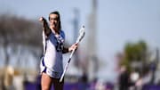 Northwestern attacker Madison Taylor points in an NCAA Lacrosse Tournament game against Michigan on May 11, 2025.