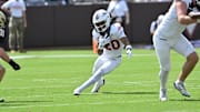 Sep 20, 2025; Blacksburg, Virginia, USA;  Virginia Tech Hokies running back P.J. Prioleau (20) runs the ball during the first quarter against the Wofford Terriers at Lane Stadium. Mandatory Credit: Brian Bishop-Imagn Images