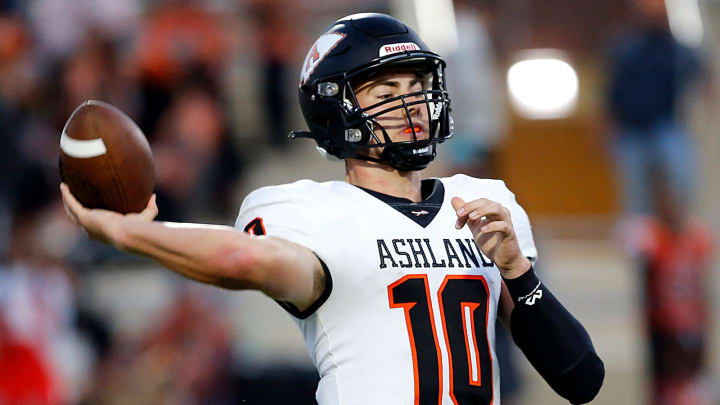 Ashland High School's Nathan Bernhard (10) throws a pass against Mansfield Senior High School during high school football action at Arlin Field Friday, Sept. 29, 2023. TOM E. PUSKAR