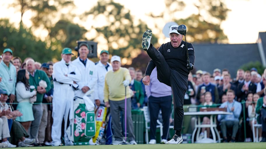 Gary Player finished his honorary starter tee shot with a kick at the 90th Masters.