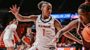 Illinois guard Aaliyah Guyton (1) locks up a Bellarmine ball-handler in the Illini's 90-41 win Tuesday at the State Farm Center in Champaign, Illinois.