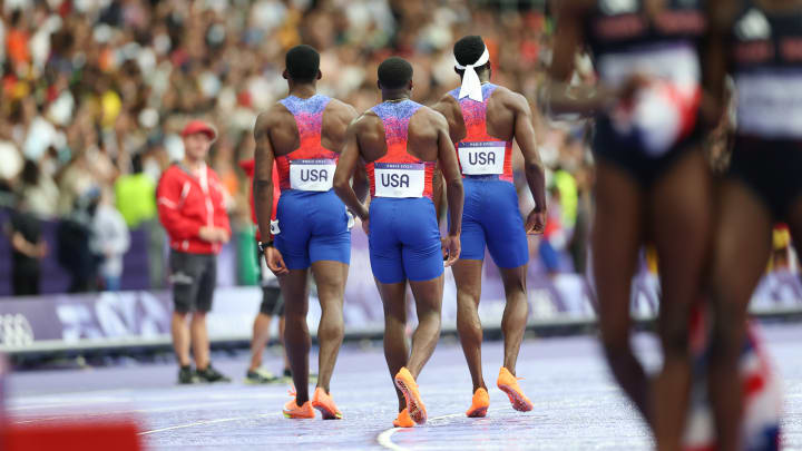 Canada won the men's 4X100-meter relay after the U.S. botched the baton pass and was disqualified.