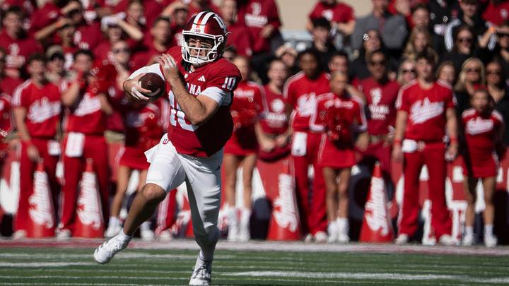 Indiana's Josh Hoover (10) runs during the Indiana versus Ohio State football game at Memorial Stadium on Saturday, Oct. 17, 2026.